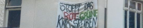 Transparent am ehemaligen Sozialen Zentrum: "Rot-grüne Kriegstreiber"
