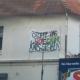 Transparent am ehemaligen Sozialen Zentrum: "Rot-grüne Kriegstreiber"