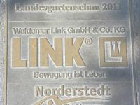 Bodenplatte mit Waldemar-Link-Werbung, Landesgartenschau 2011